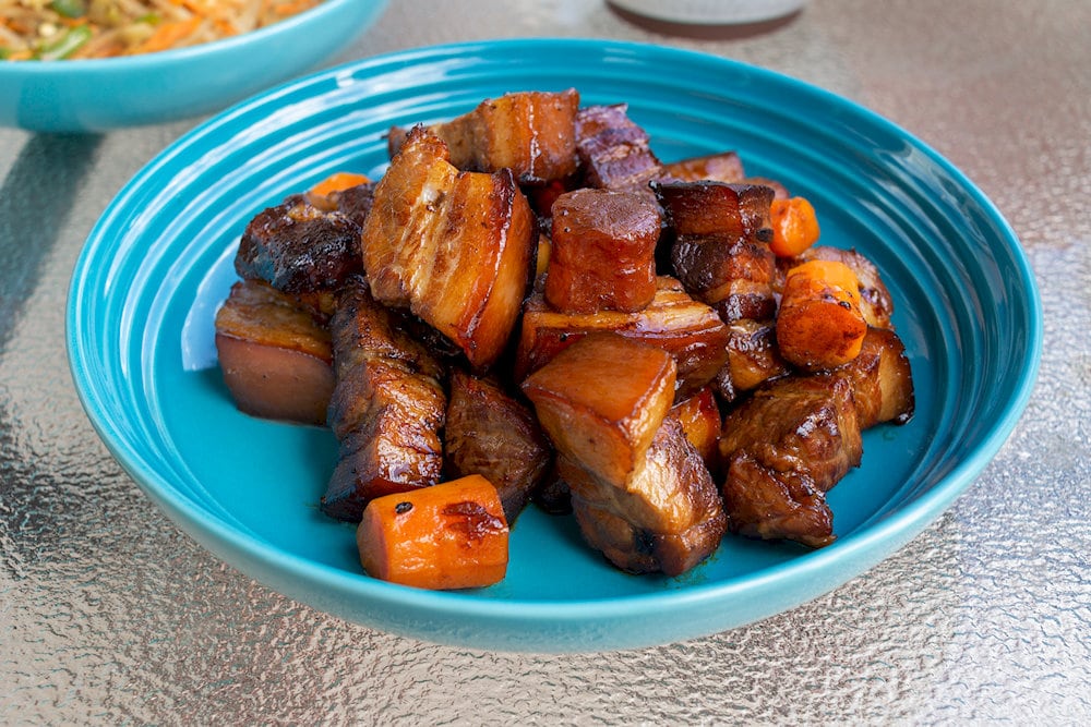 Pork belly is braised until tender and covered with a characteristic red color
